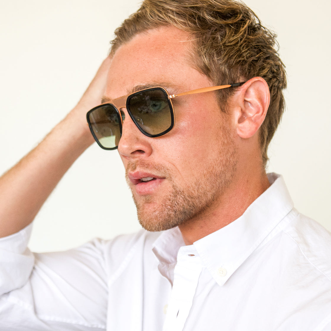 Man wearing SEE's trendy, high-end, luxury sunglasses.