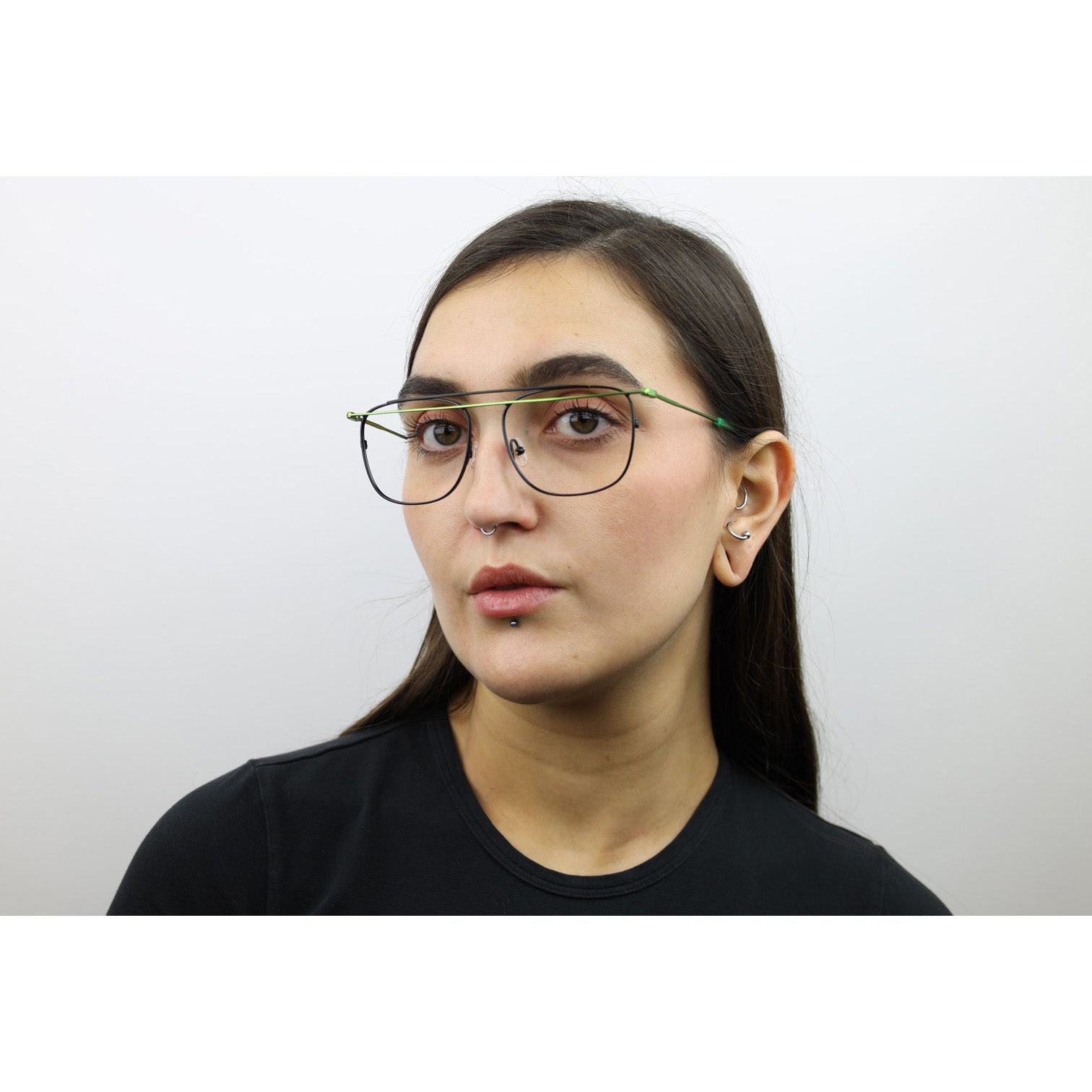 Woman wearing these luxury designer SEE Eyeglasses