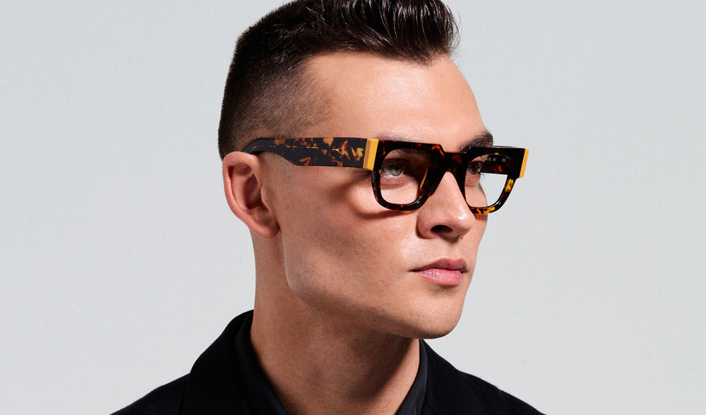 man wearing these luxury designer boutique SEE Prescription Eyeglasses