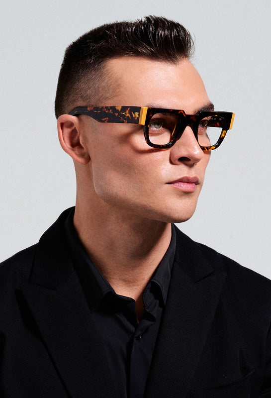 man wearing these luxury designer boutique SEE Prescription Eyeglasses