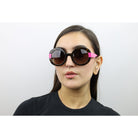 Woman wearing these luxury designer SEE Sunglasses