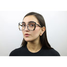 Woman wearing these luxury designer SEE Eyeglasses