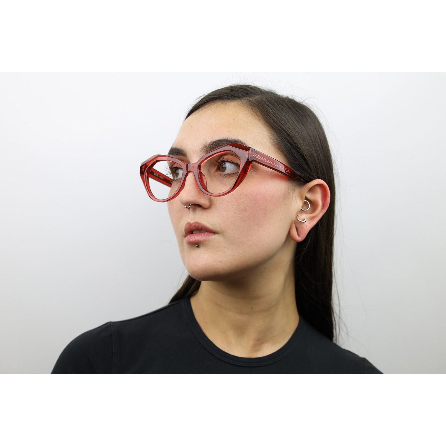 Woman wearing these luxury designer SEE Eyeglasses