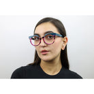 Woman wearing these luxury designer SEE Eyeglasses