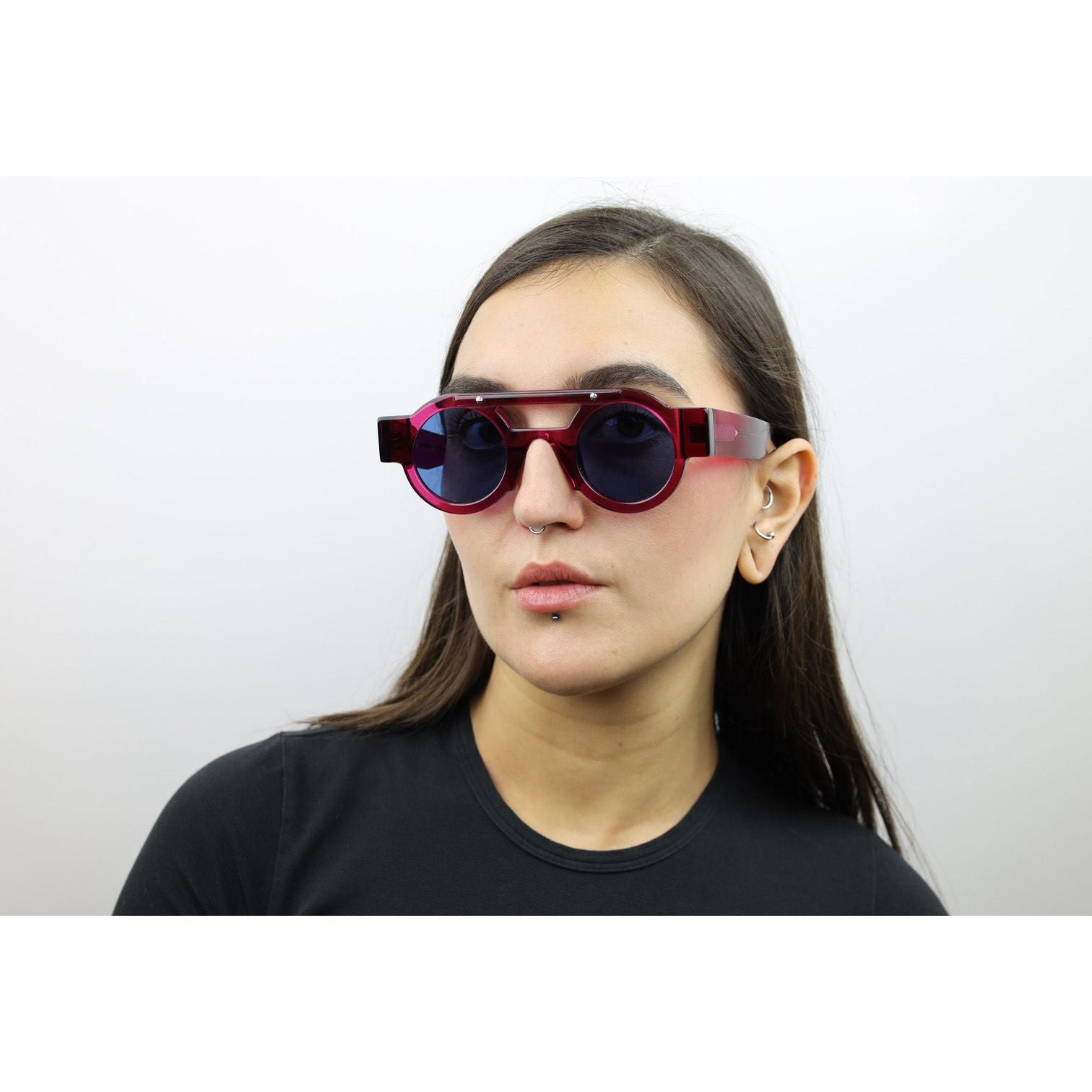 Woman wearing these luxury designer SEE Sunglasses