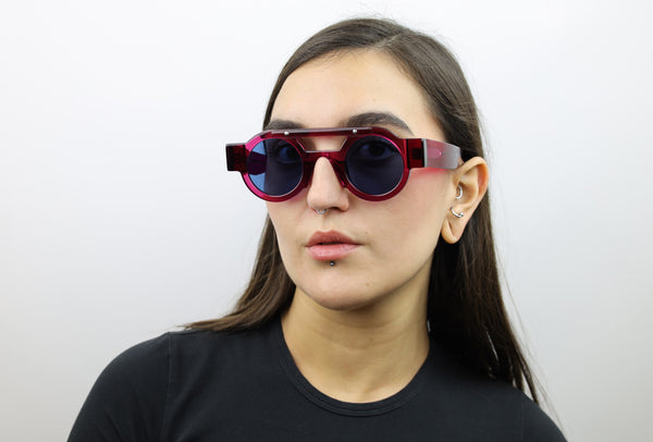 Woman wearing these luxury designer SEE Sunglasses