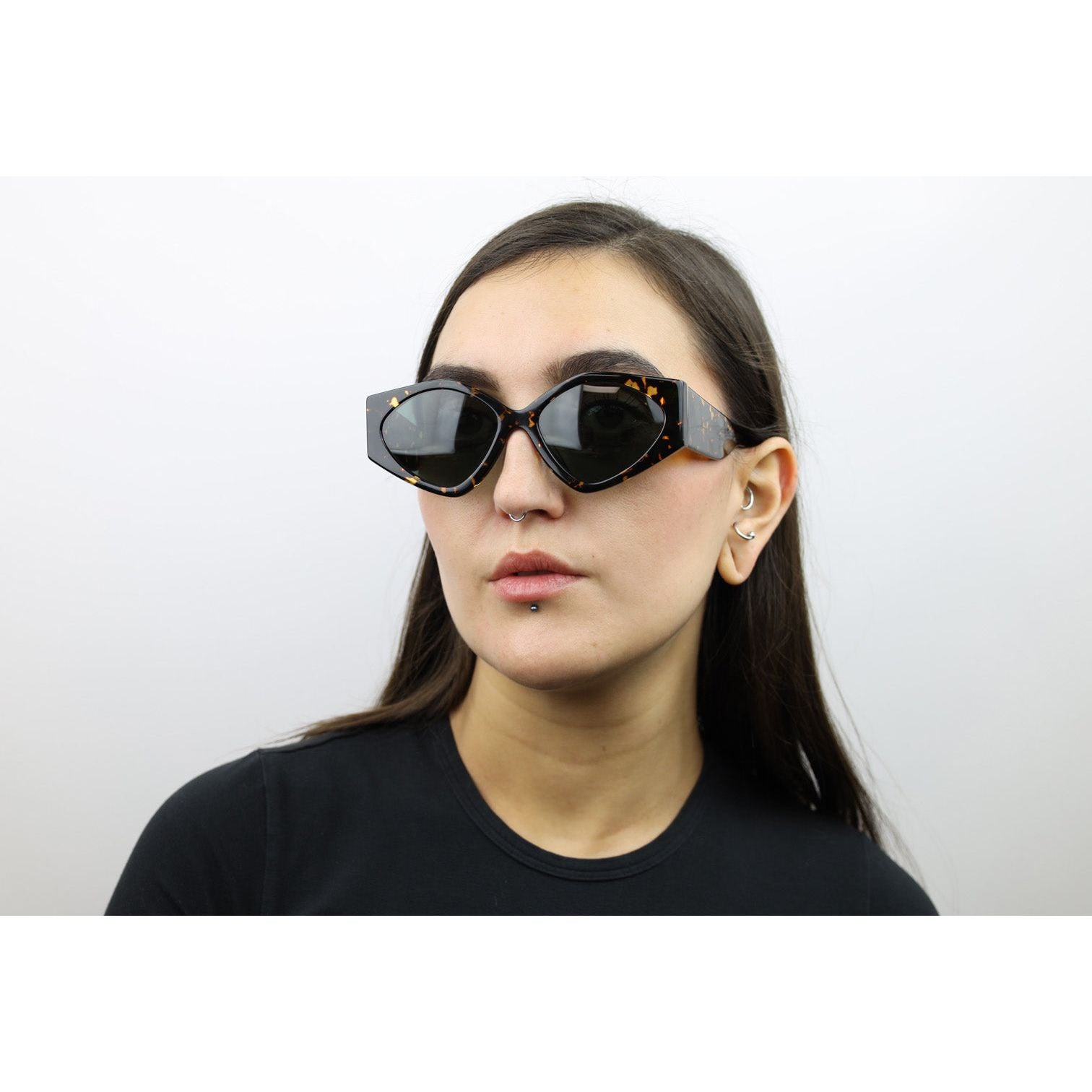 Woman wearing these luxury designer SEE Sunglasses